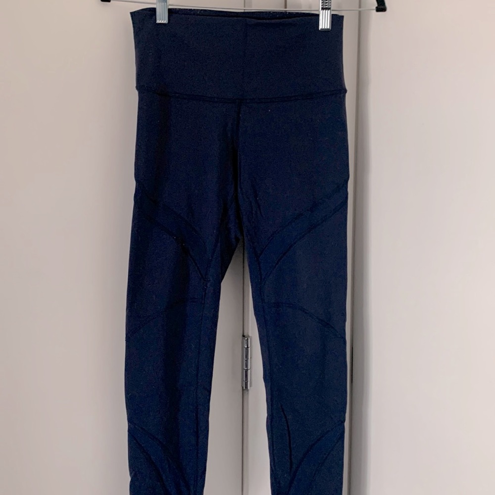 Navy blue lululemon leggings with mesh details